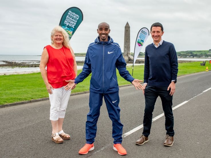 Antrim Coast Half Marathon 2021. Pictured left to right, David Roberts, Director of Strategic Development at Tourism NI, Sir Mo Farah and Michele Shirlow MBE, Tourism NI Board Member.