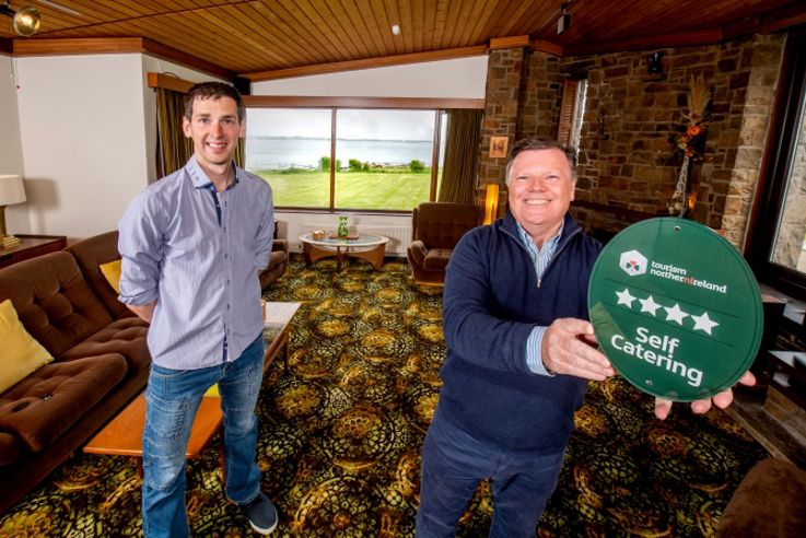 Pictured at Castlepoint villa based in Co. Down (Left-Right) are Kevin Glennon, Castlepoint Property Manager and Sean Henry, Senior Quality Advisor at Tourism NI.